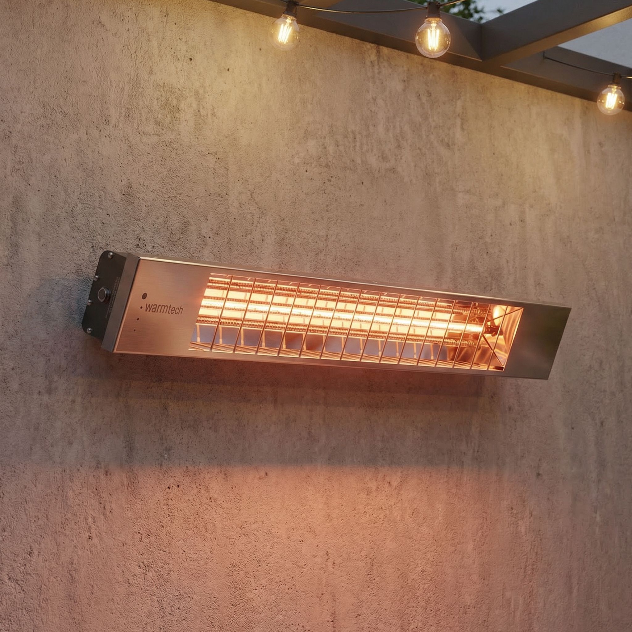 Wall-mounted stainless steel outdoor heater emitting warm orange light, installed on a concrete wall in an outdoor setting